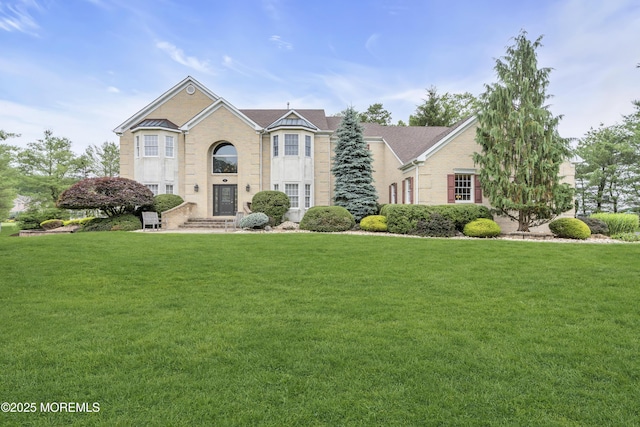 329 Valley View Cir, Freehold, NJ 07728 - view of front of home featuring a front yard and brick siding