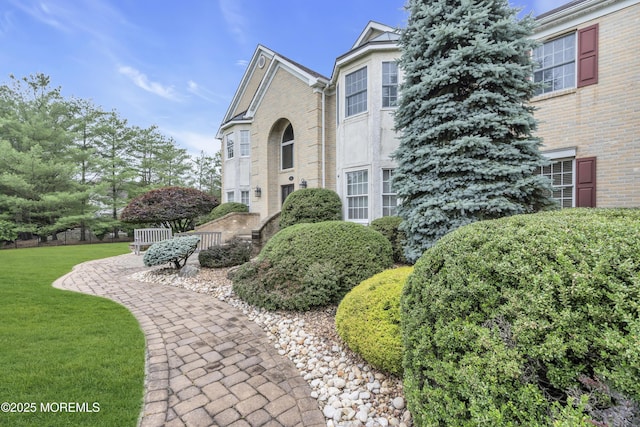 329 Valley View Cir, Freehold, NJ 07728 - view of side of home featuring brick siding and a yard