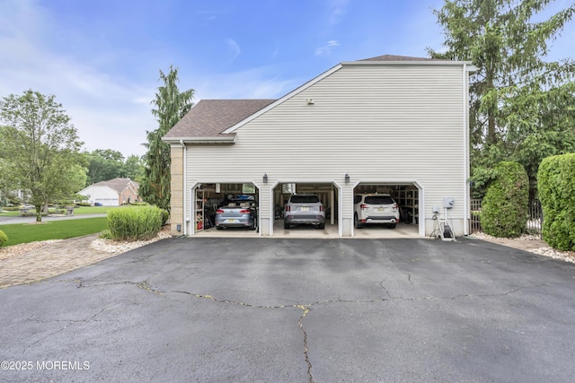 329 Valley View Cir, Freehold, NJ 07728 - view of home's exterior featuring driveway and a shingled roof