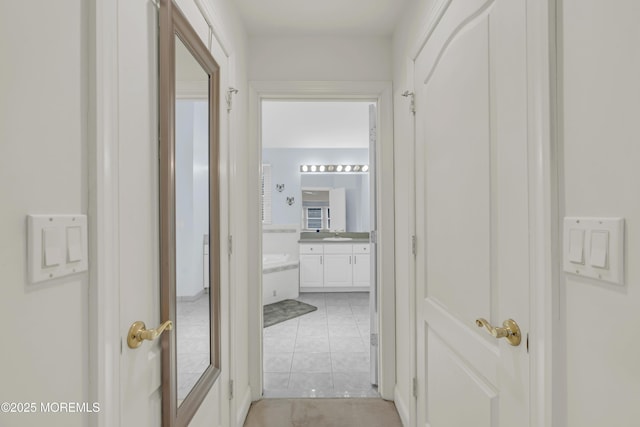 329 Valley View Cir, Freehold, NJ 07728 - hall featuring light tile patterned floors and a sink