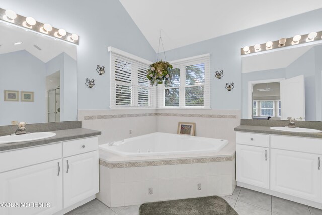 329 Valley View Cir, Freehold, NJ 07728 - full bath featuring tile patterned flooring, lofted ceiling, two vanities, a garden tub, and a shower stall