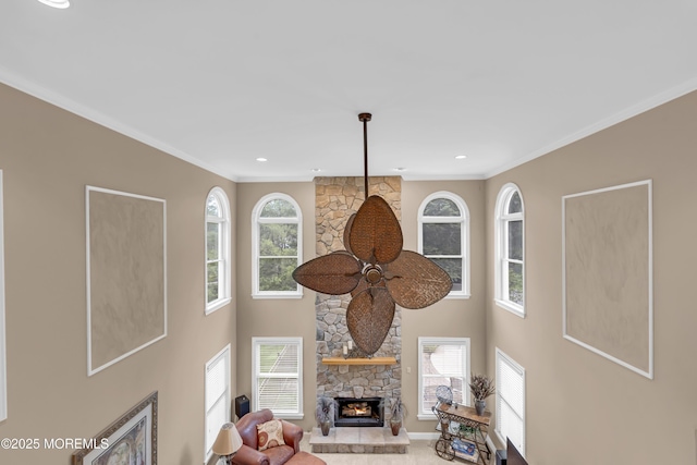 329 Valley View Cir, Freehold, NJ 07728 - living area with a fireplace, healthy amount of natural light, ornamental molding, recessed lighting, and a ceiling fan