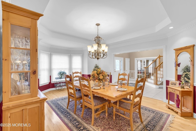 329 Valley View Cir, Freehold, NJ 07728 - dining room with a chandelier, a tray ceiling, stairs, ornamental molding, and recessed lighting
