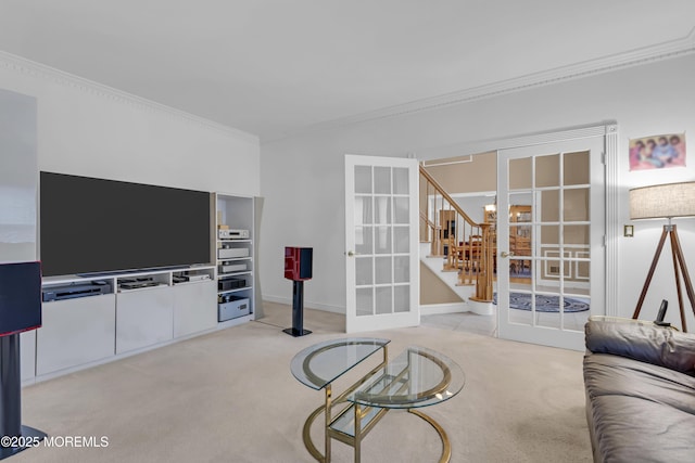329 Valley View Cir, Freehold, NJ 07728 - living area with french doors, light colored carpet, ornamental molding, and stairs
