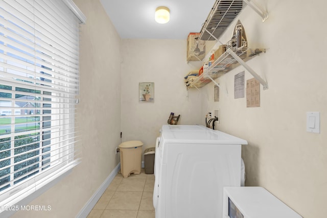 329 Valley View Cir, Freehold, NJ 07728 - laundry area featuring washer / dryer, healthy amount of natural light, and light tile patterned floors
