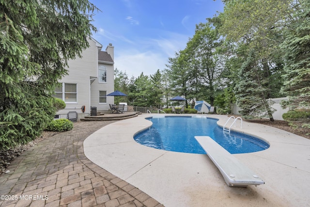329 Valley View Cir, Freehold, NJ 07728 - view of pool with a patio area, a diving board, and outdoor dining space