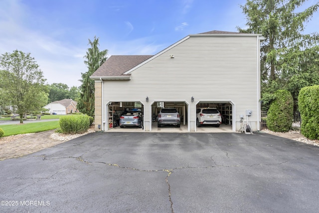 329 Valley View Cir, Freehold, NJ 07728 - view of property exterior featuring asphalt driveway and a shingled roof