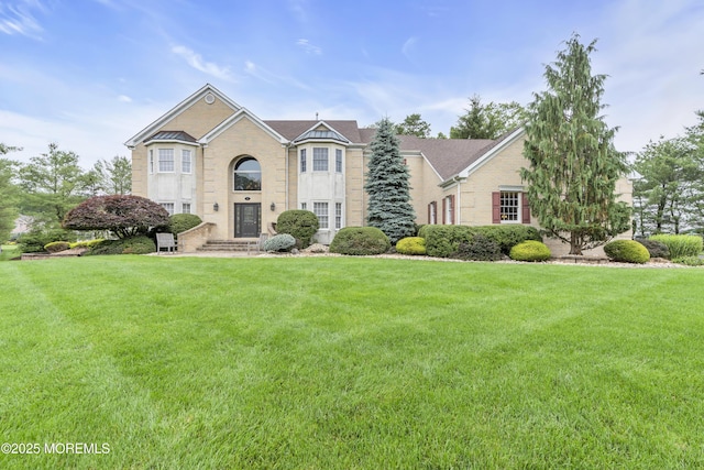 329 Valley View Cir, Freehold, NJ 07728 - view of front of property featuring a front yard and brick siding