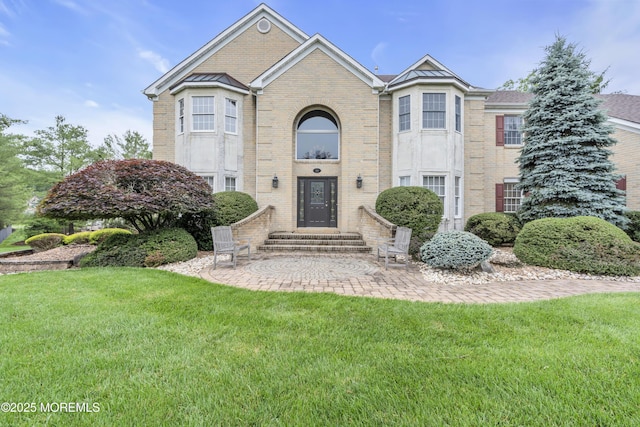 329 Valley View Cir, Freehold, NJ 07728 - view of front of home featuring brick siding, a front yard, and entry steps
