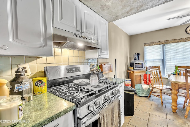 74 Fieldcrest Way, Hazlet, NJ 07730 - kitchen featuring stainless steel range with gas cooktop, under cabinet range hood, white cabinets, and backsplash