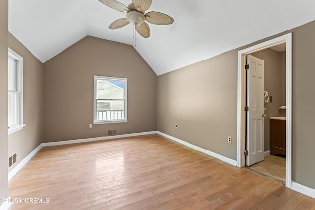 76 9th St, Belford, NJ 07718 - spare room with ceiling fan, light wood-style flooring, and lofted ceiling