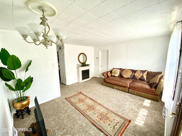 451 Brookside Ave, Laurence Harbor, NJ 08879 - living room with carpet flooring, a chandelier, and a fireplace