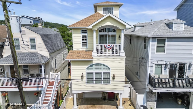 14 Seadrift Ave, Highlands, NJ 07732 - back of house with a balcony and a shingled roof