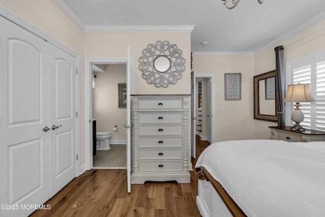 14 Seadrift Ave, Highlands, NJ 07732 - bedroom featuring ornamental molding, dark wood finished floors, ensuite bathroom, and a closet