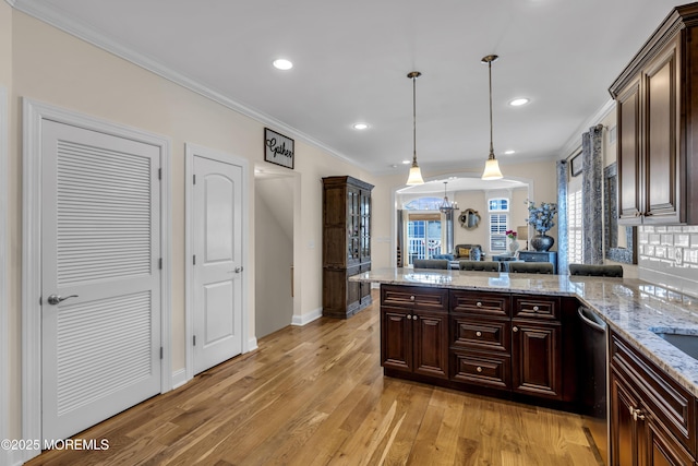 14 Seadrift Ave, Highlands, NJ 07732 - kitchen featuring ornamental molding, dark brown cabinets, dishwasher, a peninsula, and light wood-style flooring