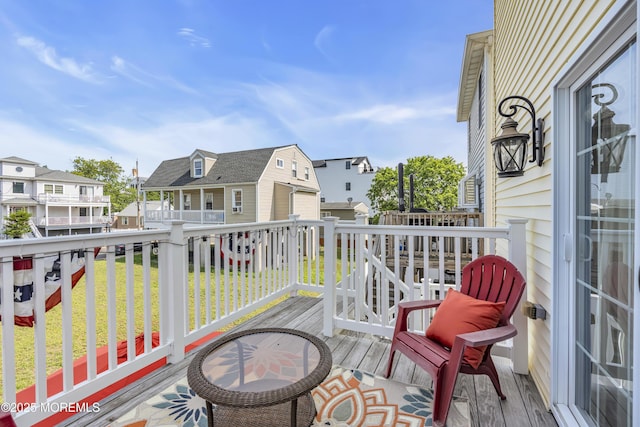 14 Seadrift Ave, Highlands, NJ 07732 - view of wooden balcony featuring a residential view and a deck
