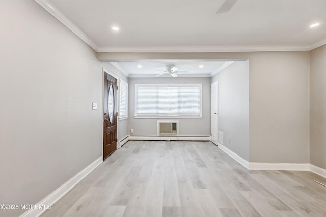 6 S Heron St Unit A, Manchester, NJ 08759 - spare room with ceiling fan, baseboard heating, light wood-style floors, ornamental molding, and a baseboard heating unit