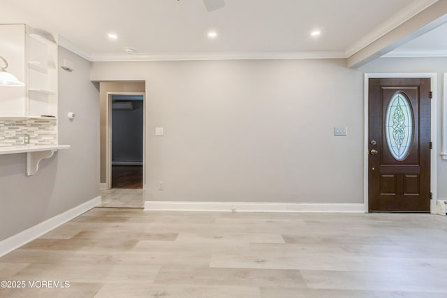 6 S Heron St Unit A, Manchester, NJ 08759 - entrance foyer with light wood-style flooring, crown molding, a baseboard heating unit, recessed lighting, and ceiling fan