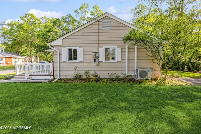 6 S Heron St Unit A, Manchester, NJ 08759 - view of side of property featuring a lawn