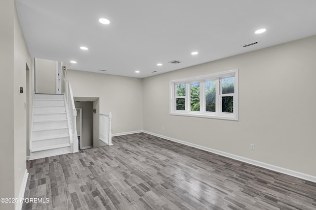 1217 Madison Ave, Toms River, NJ 08757 - unfurnished living room featuring wood finished floors, recessed lighting, and stairs