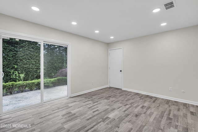 1217 Madison Ave, Toms River, NJ 08757 - unfurnished room featuring wood finished floors, recessed lighting, and plenty of natural light
