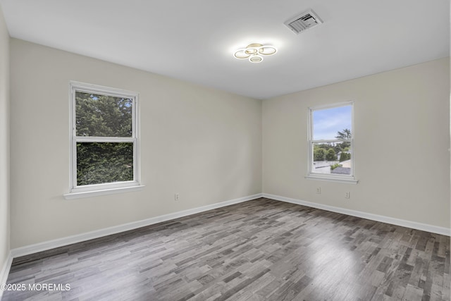 1217 Madison Ave, Toms River, NJ 08757 - spare room with wood finished floors and baseboards
