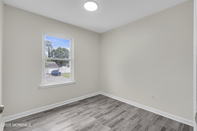 1217 Madison Ave, Toms River, NJ 08757 - unfurnished room featuring wood finished floors and baseboards