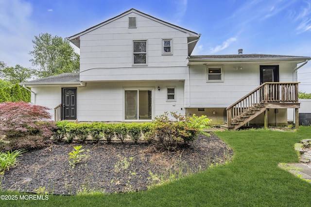 1217 Madison Ave, Toms River, NJ 08757 - rear view of property featuring a yard, a shingled roof, and stairs