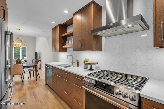 8 Eunice Ter, West Long Branch, NJ 07764 - kitchen with wall chimney range hood, stainless steel appliances, open shelves, light wood finished floors, and a chandelier