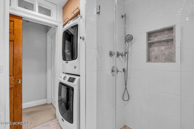 8 Eunice Ter, West Long Branch, NJ 07764 - laundry area featuring stacked washing machine and dryer and light carpet