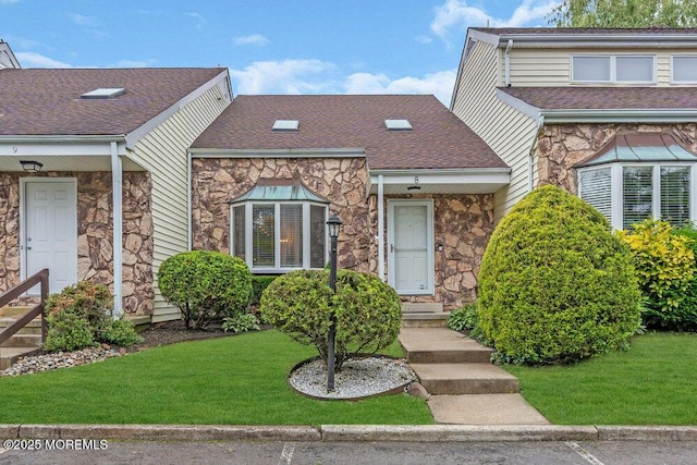 8 Eunice Ter, West Long Branch, NJ 07764 - view of front of house with stone siding and a front lawn