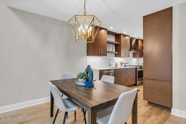 8 Eunice Ter, West Long Branch, NJ 07764 - dining area featuring a chandelier, light wood finished floors, and recessed lighting