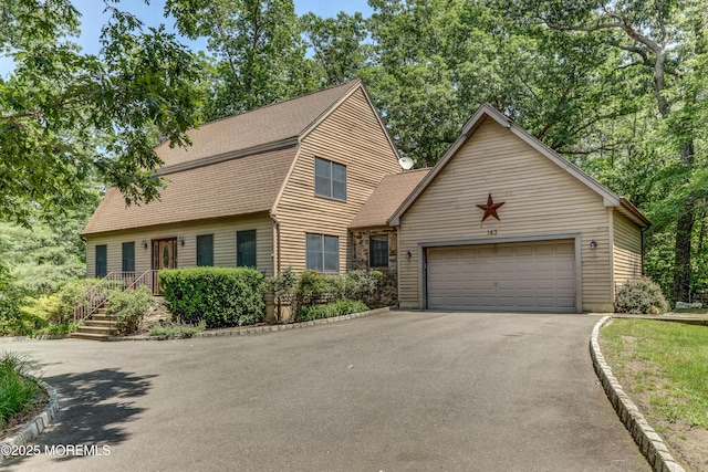 143 Siloam Rd, Freehold, NJ 07728 - view of front of house featuring driveway, an attached garage, and roof with shingles