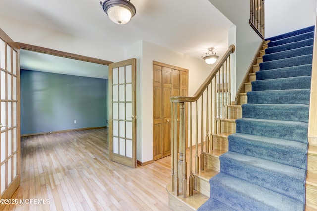 143 Siloam Rd, Freehold, NJ 07728 - stairs with french doors and wood finished floors