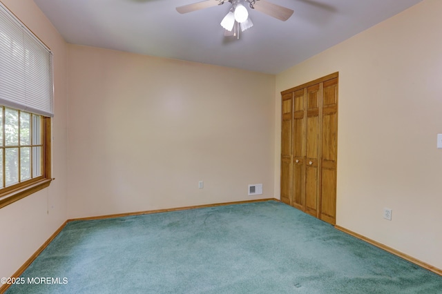 143 Siloam Rd, Freehold, NJ 07728 - unfurnished bedroom with carpet floors, a closet, and a ceiling fan
