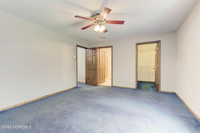 143 Siloam Rd, Freehold, NJ 07728 - unfurnished bedroom featuring carpet, a spacious closet, and a ceiling fan