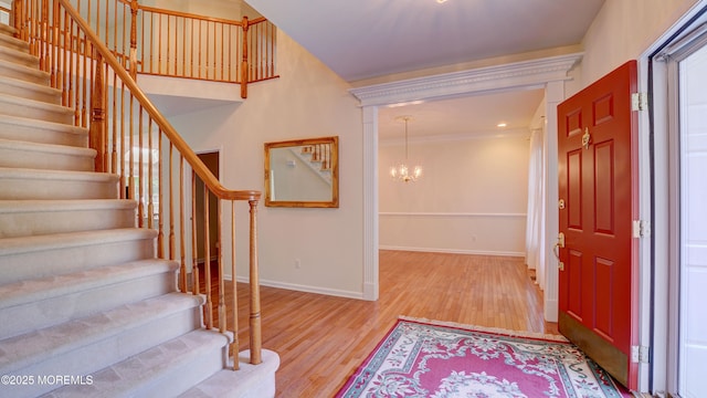 88 Vanderveer Dr, Basking Ridge, NJ 07920 - entryway with stairs, wood finished floors, and a chandelier