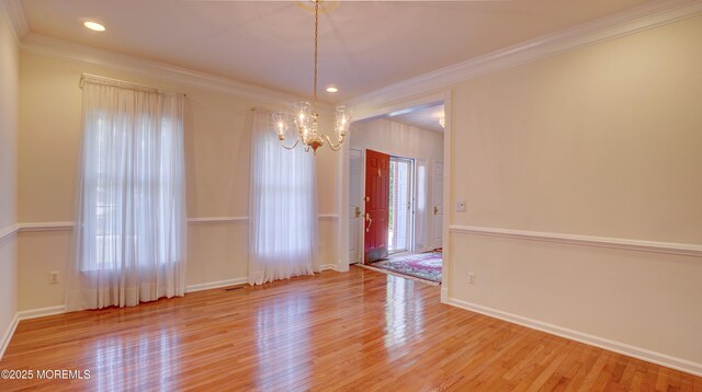 88 Vanderveer Dr, Basking Ridge, NJ 07920 - unfurnished dining area with a chandelier, wood finished floors, crown molding, and recessed lighting
