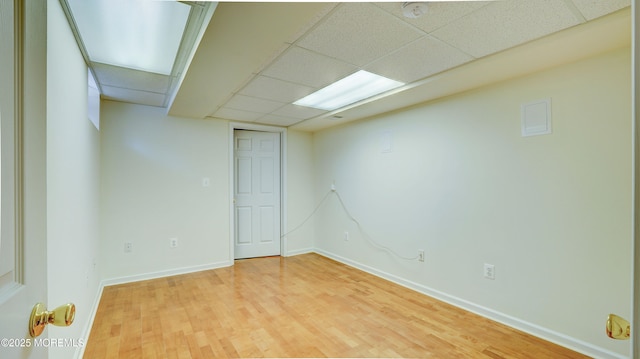 88 Vanderveer Dr, Basking Ridge, NJ 07920 - unfurnished room with a drop ceiling, light wood-style floors, and a smoke detector