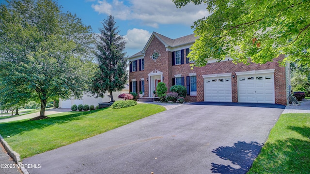 88 Vanderveer Dr, Basking Ridge, NJ 07920 - view of front of property with driveway, brick siding, and a front lawn