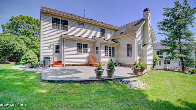 88 Vanderveer Dr, Basking Ridge, NJ 07920 - back of house featuring a patio, entry steps, a chimney, and a lawn