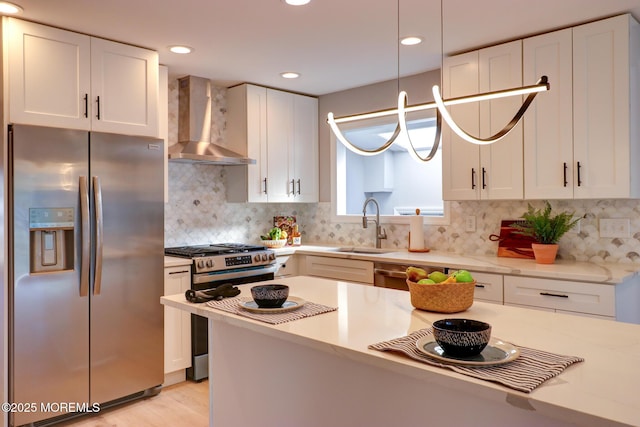 42 Cherry Tree Farm Rd, Middletown, NJ 07748 - kitchen with stainless steel appliances, wall chimney exhaust hood, white cabinets, decorative backsplash, and recessed lighting
