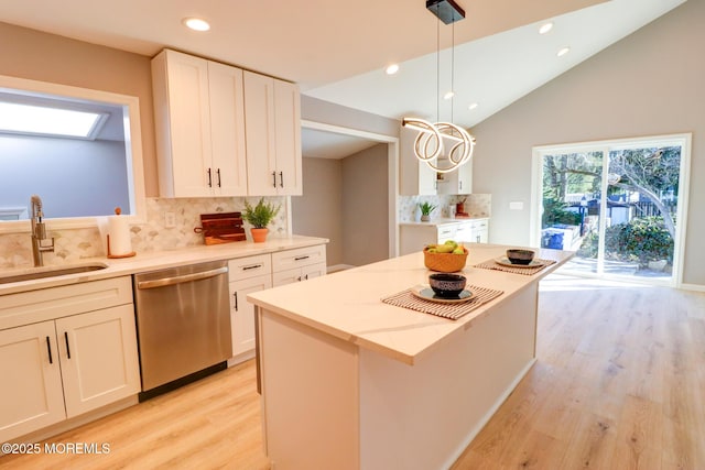 42 Cherry Tree Farm Rd, Middletown, NJ 07748 - kitchen featuring stainless steel dishwasher, light wood finished floors, decorative backsplash, white cabinetry, and recessed lighting