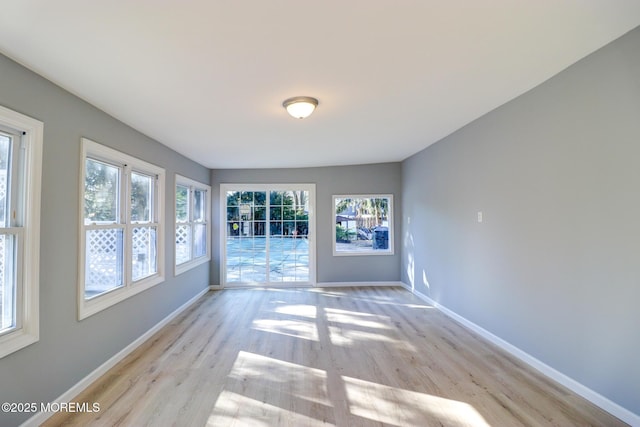 42 Cherry Tree Farm Rd, Middletown, NJ 07748 - unfurnished room with healthy amount of natural light and wood finished floors