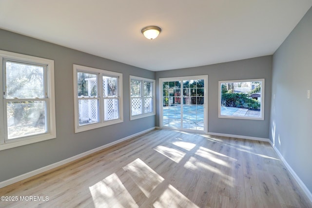 42 Cherry Tree Farm Rd, Middletown, NJ 07748 - spare room featuring wood finished floors and baseboards