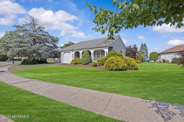 50 Normanton Ave, Manchester, NJ 08759 - view of front of property with a garage, a front yard, and driveway