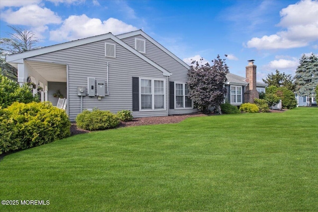 50 Normanton Ave, Manchester, NJ 08759 - back of property featuring a yard and a chimney