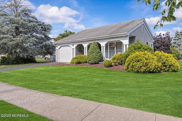 50 Normanton Ave, Manchester, NJ 08759 - ranch-style home featuring an attached garage, asphalt driveway, a front yard, and roof with shingles