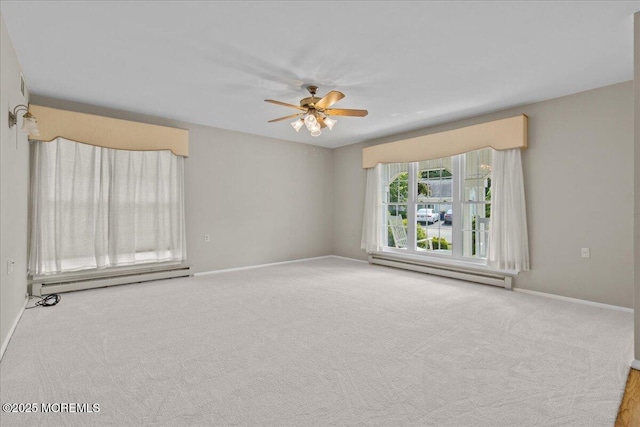 50 Normanton Ave, Manchester, NJ 08759 - spare room featuring a baseboard heating unit, ceiling fan, and carpet floors