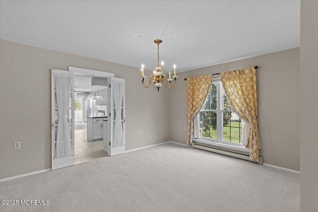 50 Normanton Ave, Manchester, NJ 08759 - empty room featuring a chandelier, light colored carpet, plenty of natural light, and a baseboard radiator